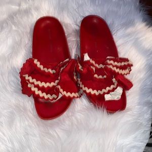 Red leather ruffle slides